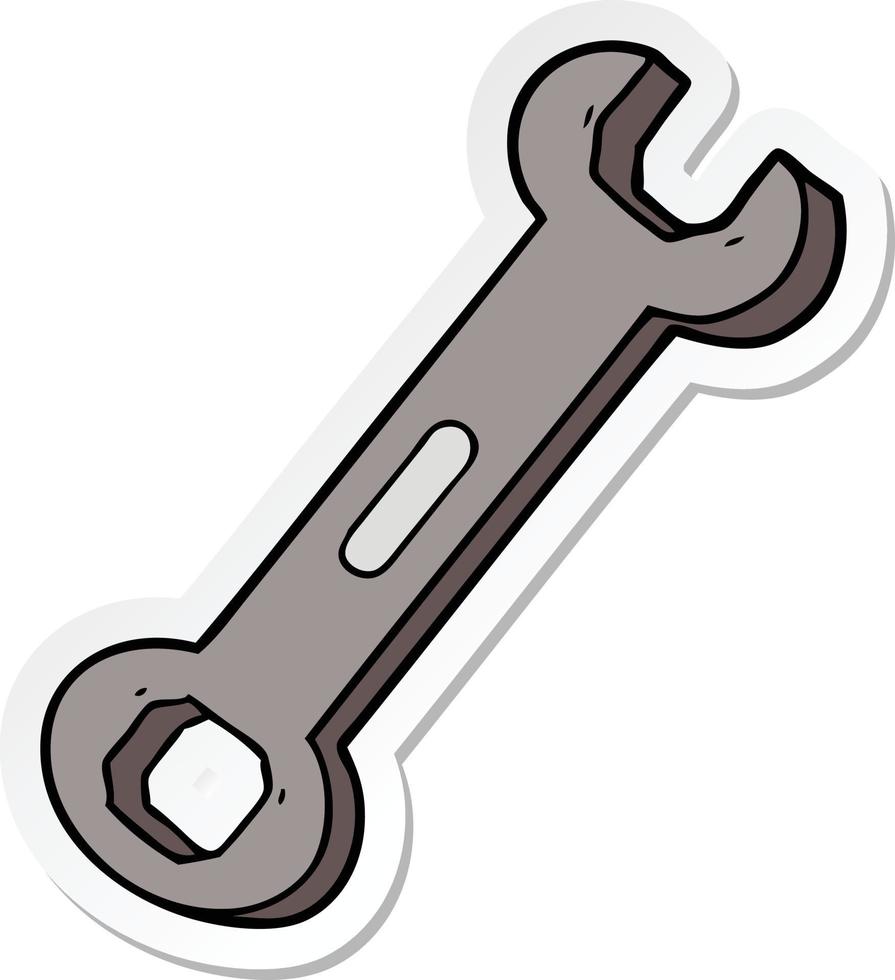 sticker of a cartoon spanner vector