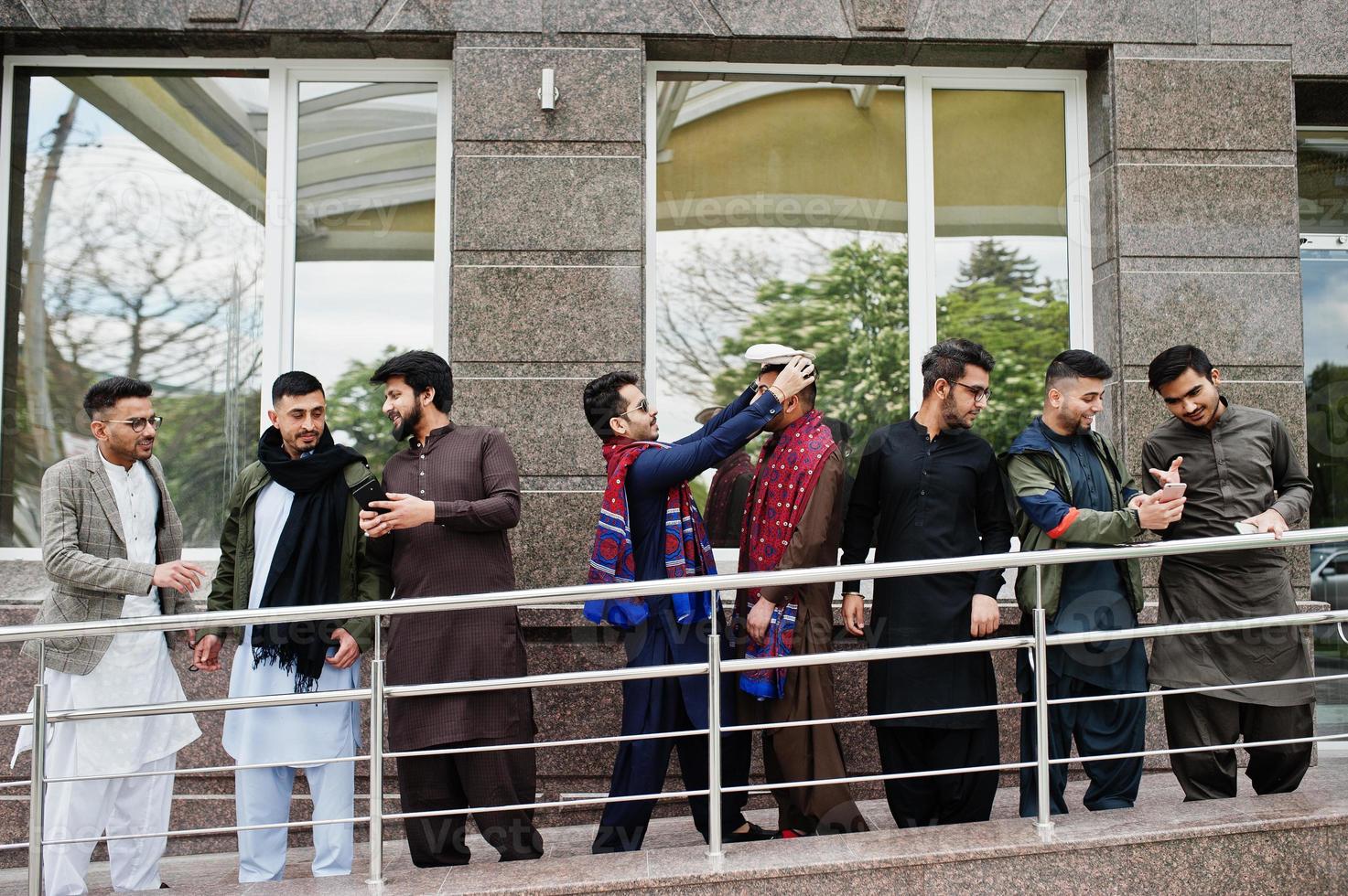 Group of pakistani man wearing traditional clothes salwar kameez or kurta. photo