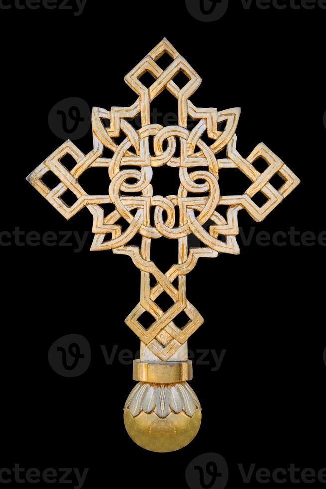 Cross isolated on black photo