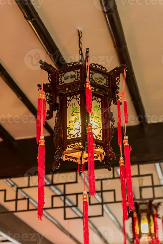 traditional Chinese Style Interior decoration. Lanterns on the ceiling photo