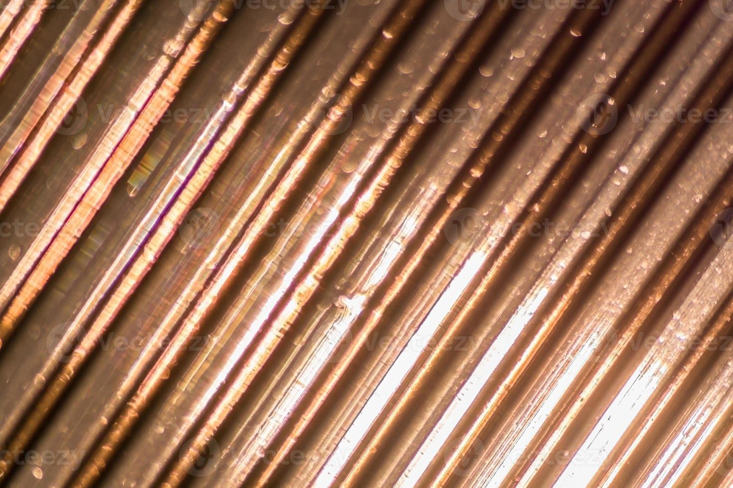 Defocused Polycarbonate plastic sheet, abstract background texture photo