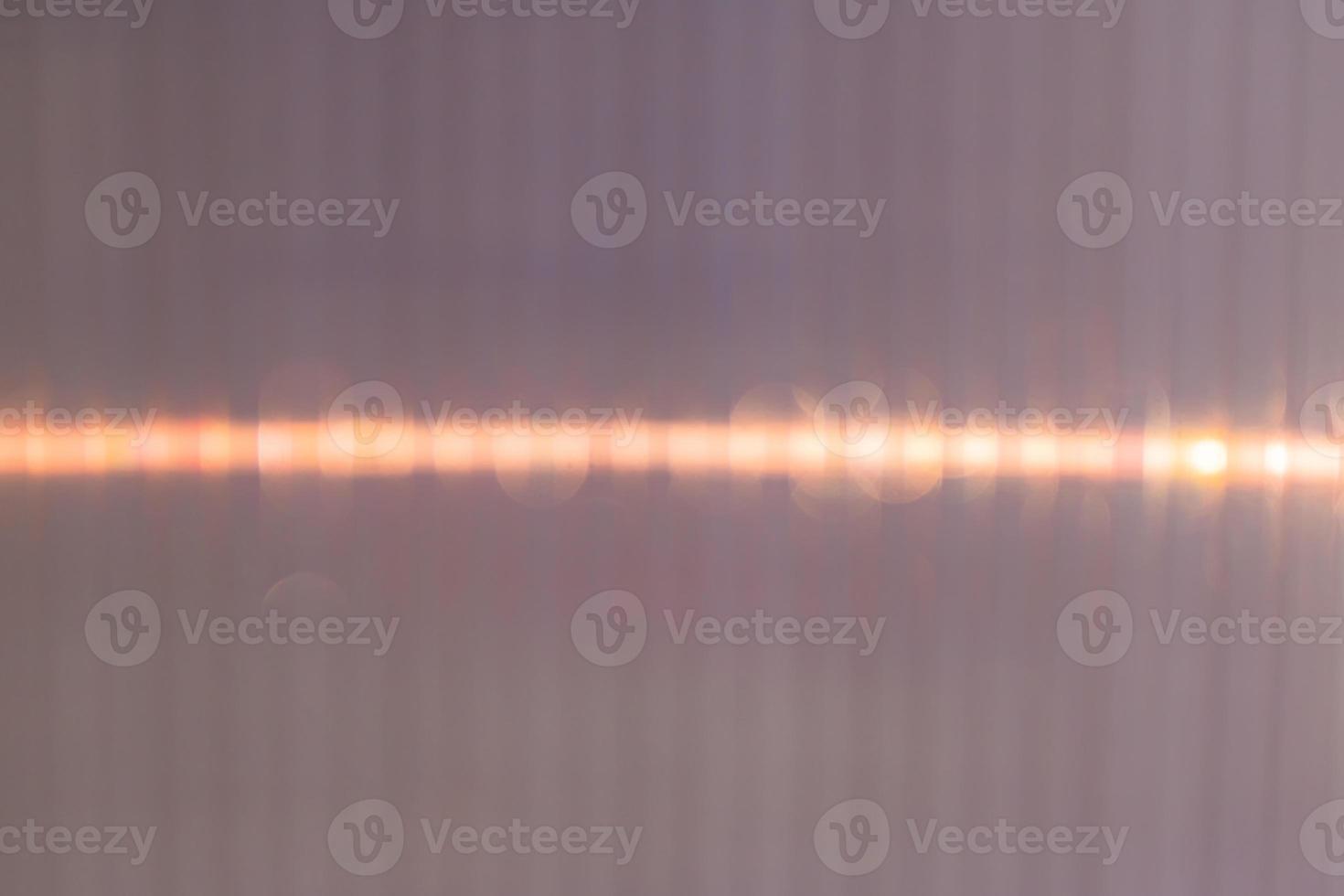 Defocused Polycarbonate plastic sheet, abstract background texture photo