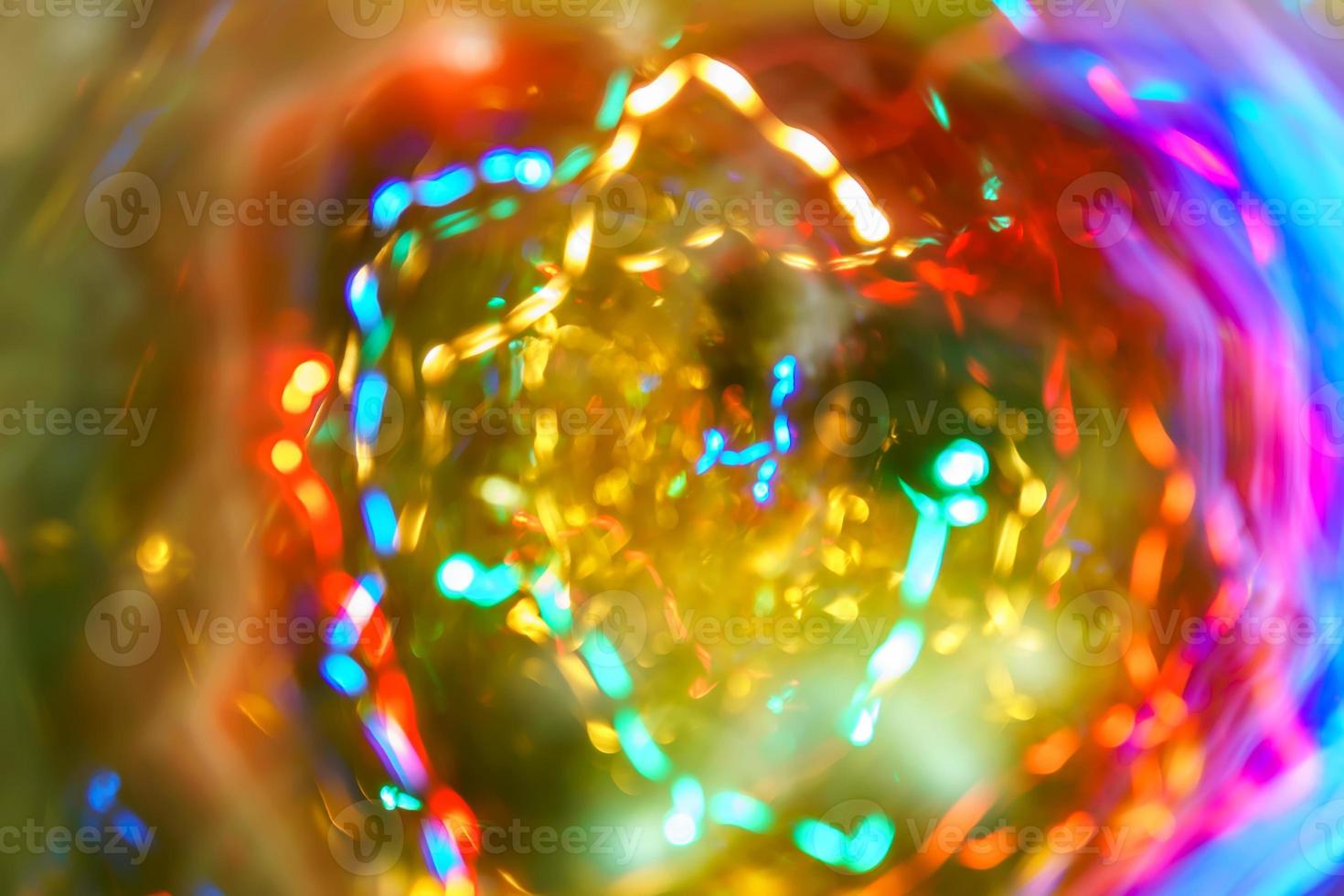 Abstract burred texture background of colorful bokeh motion. Long exposure of small neon lights photo