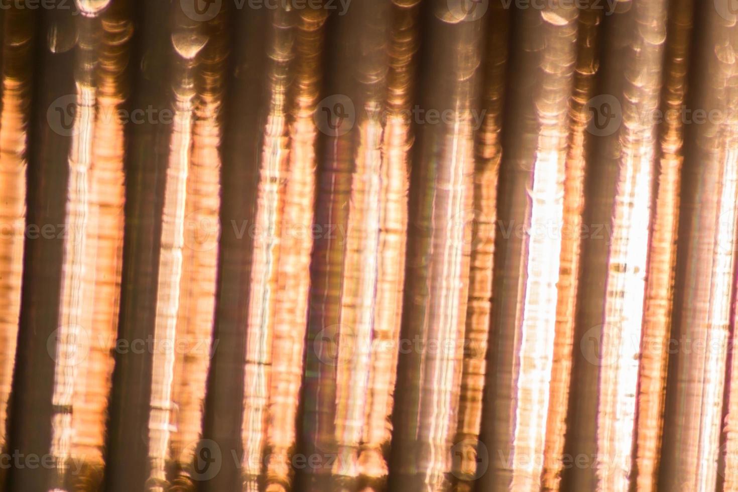 Defocused Polycarbonate plastic sheet, abstract background texture photo