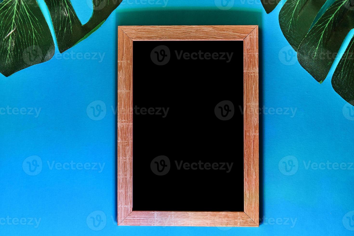 mockup frame with golden stars and monstera leaf photo