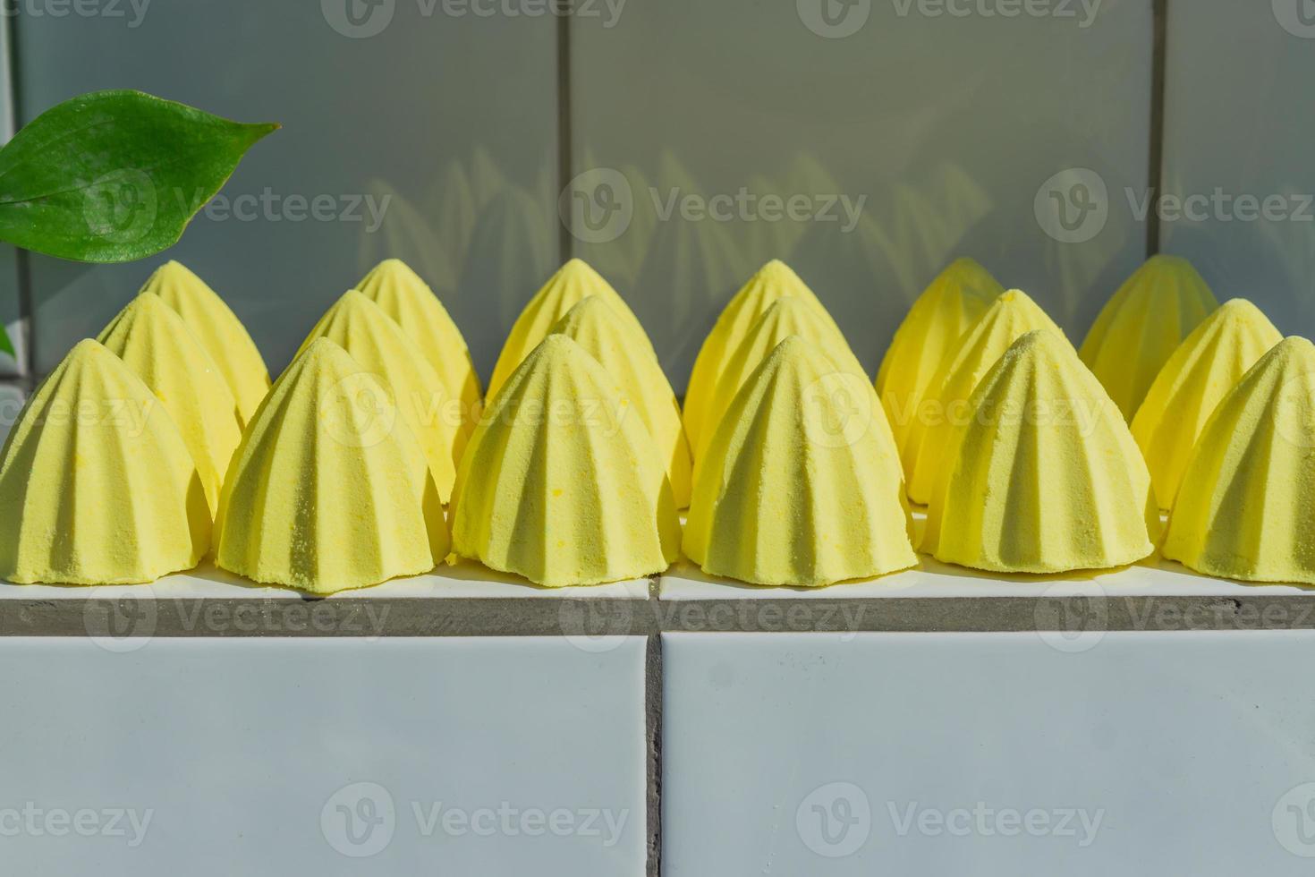 Natural aromatherapy yellow bath balls in cone shape for Beauty and spa photo