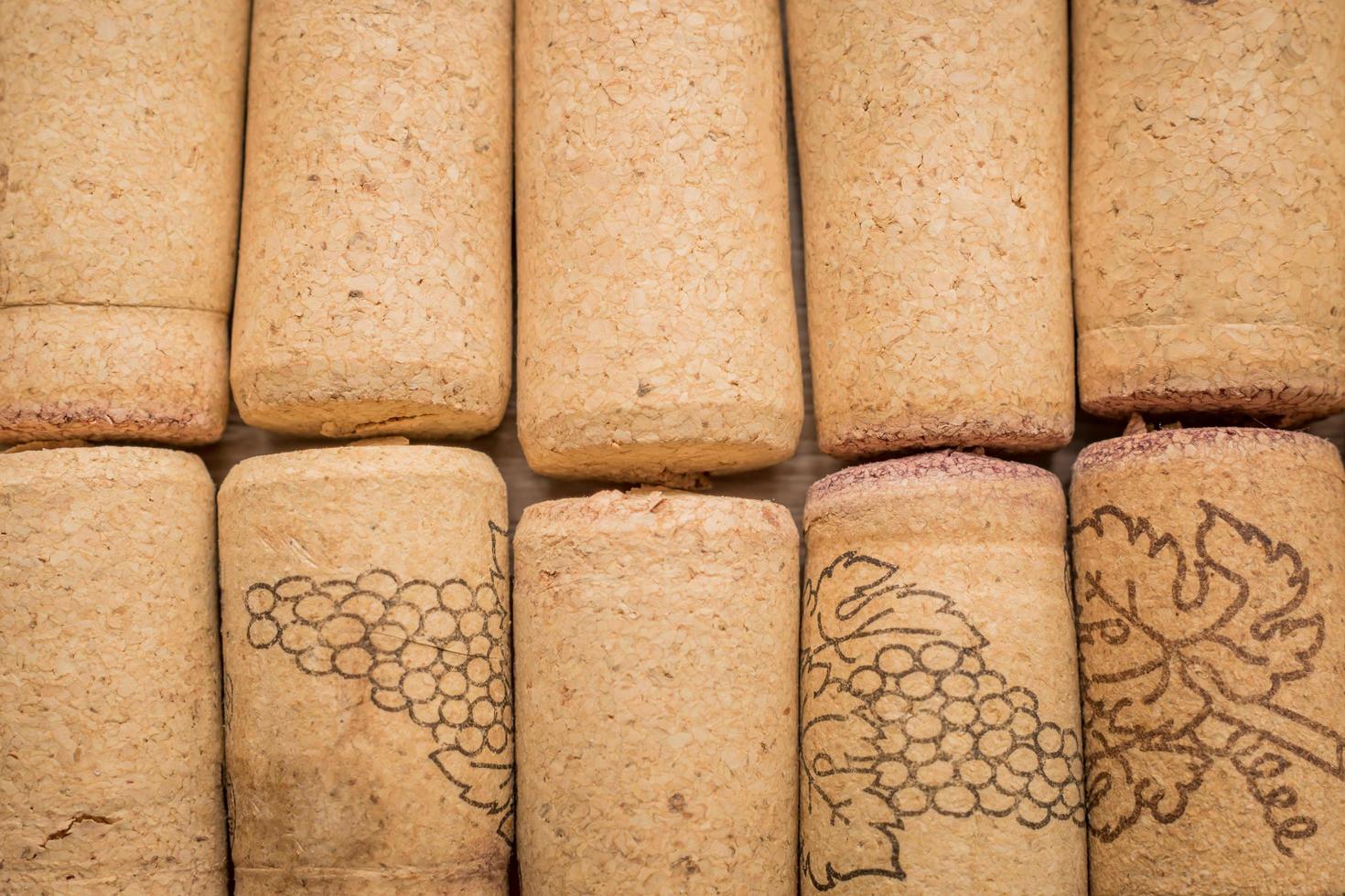 used vine corks background. Close up of bottle stoppers photo