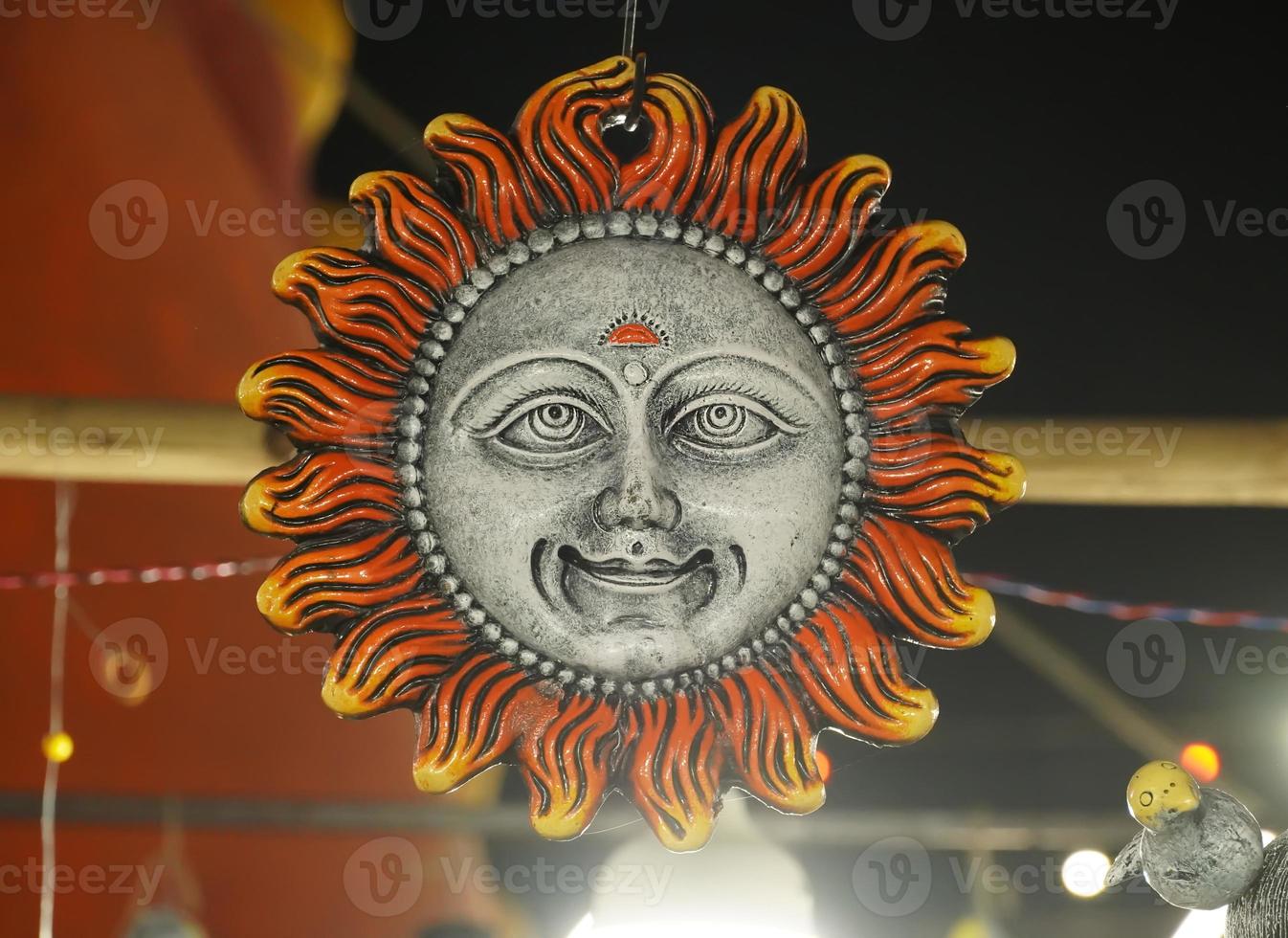 sculpture of a indian surya god image photo