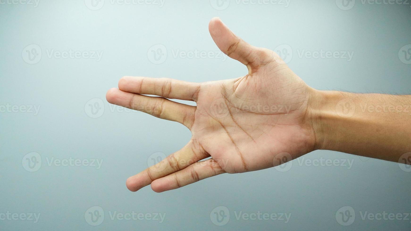 style of hand finger sign isolated on white background photo