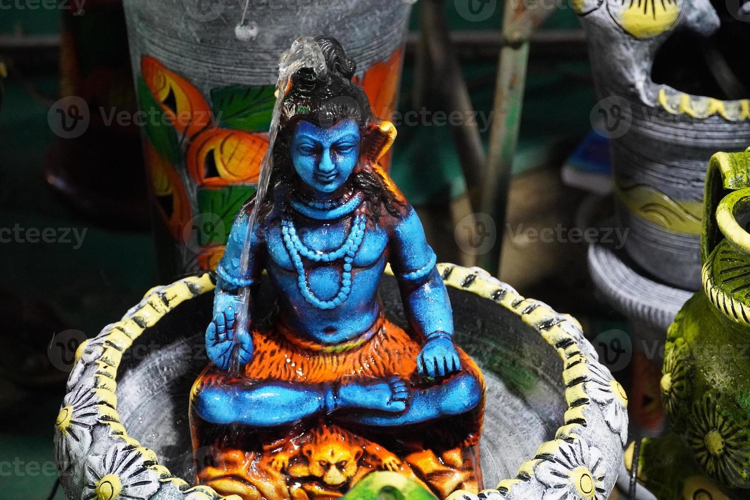 image of handmade wooden lord shiva. photo