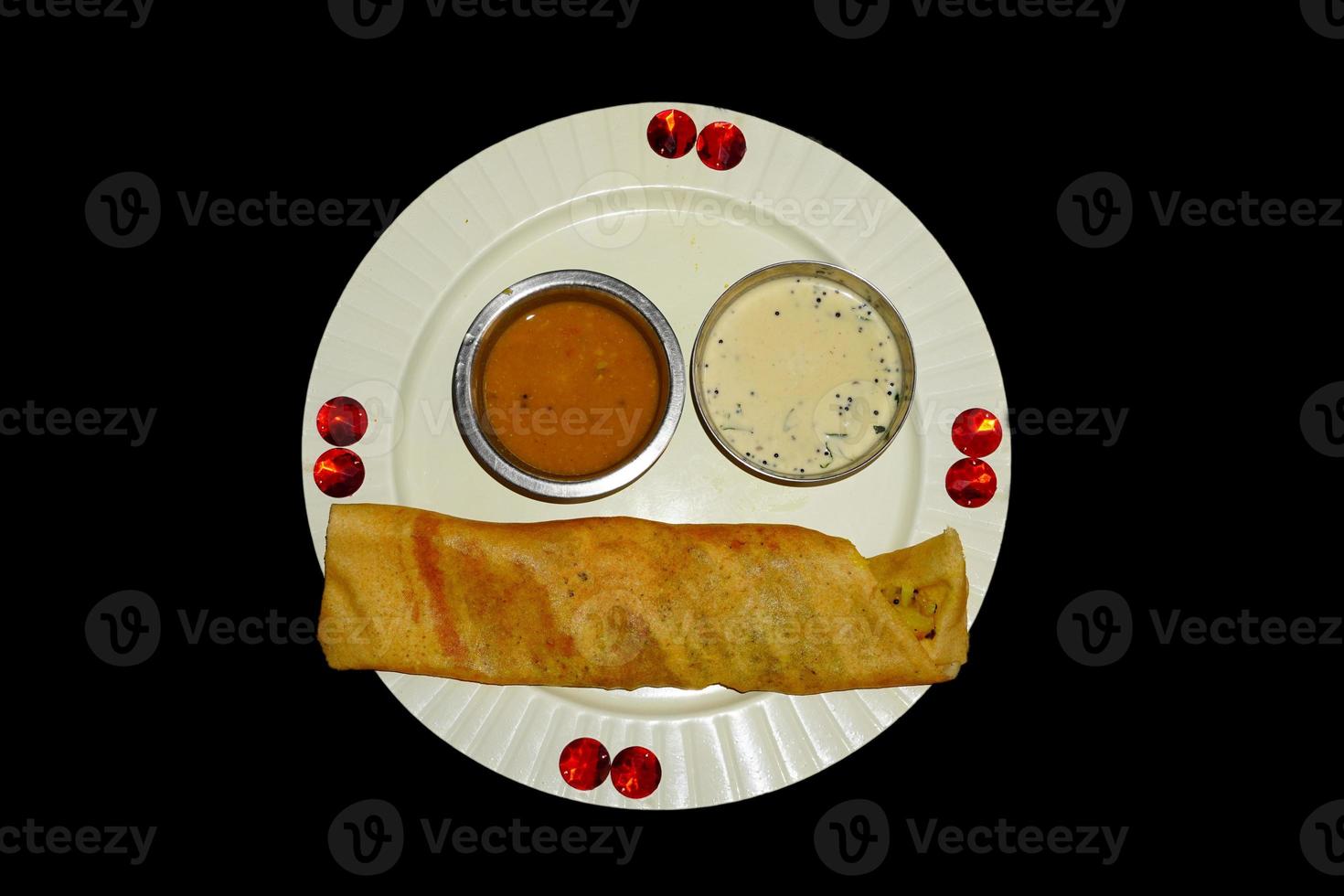 famous south indian food dosa with coconut sauce. 10601649 Stock Photo