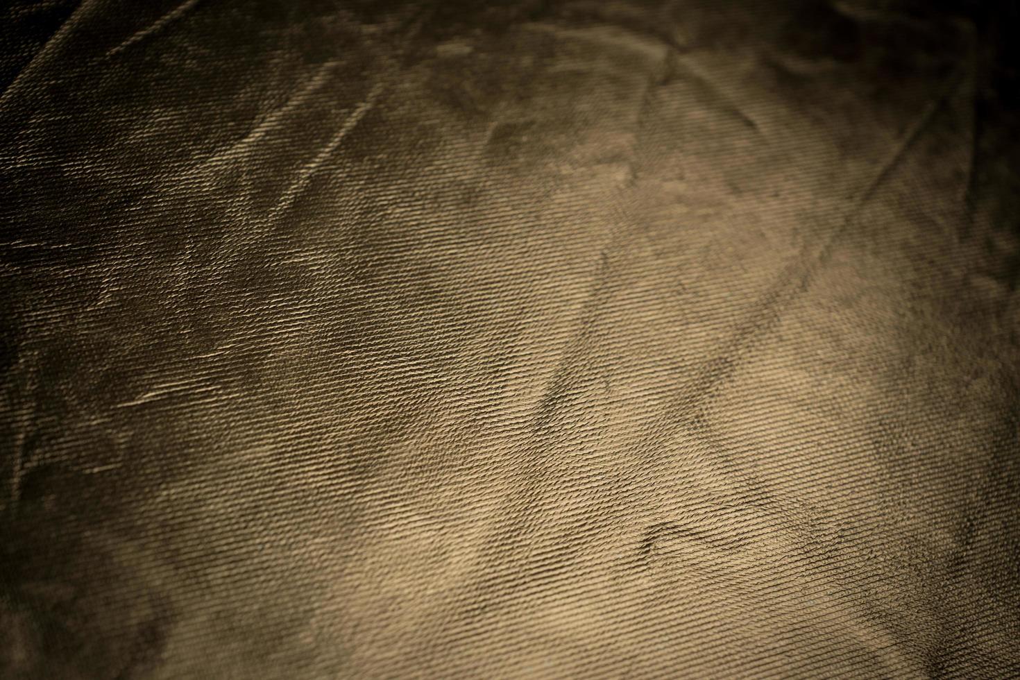 Shiny bronze background texture with scratches with copy space photo