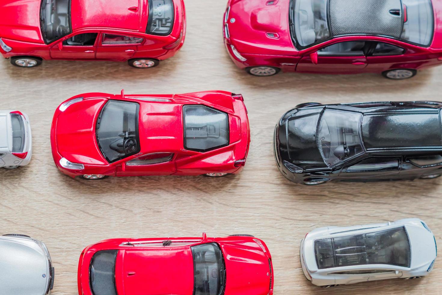 Moscow, Russia, 2018 - colorful toy car collection on wooden table. Top view. photo