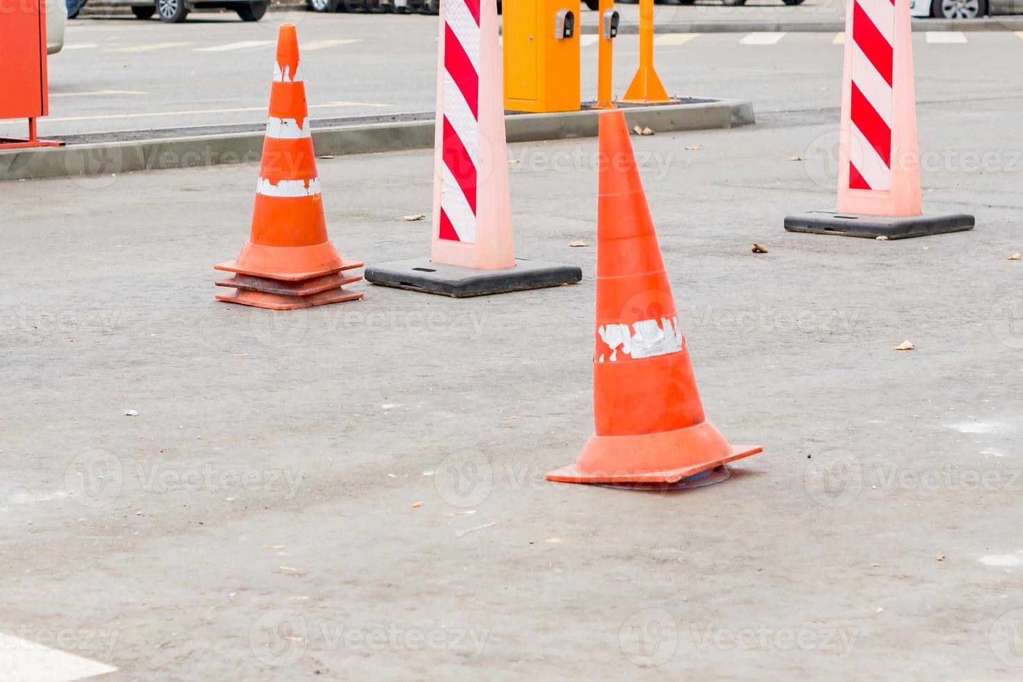 traffic cones in the middle of the street. traffic safety and roadwork signs photo