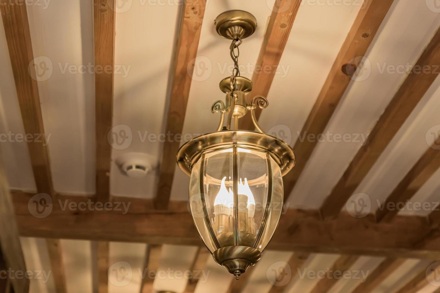 vintage bras chandelier from glass, and metal on the ceiling, bottom view photo