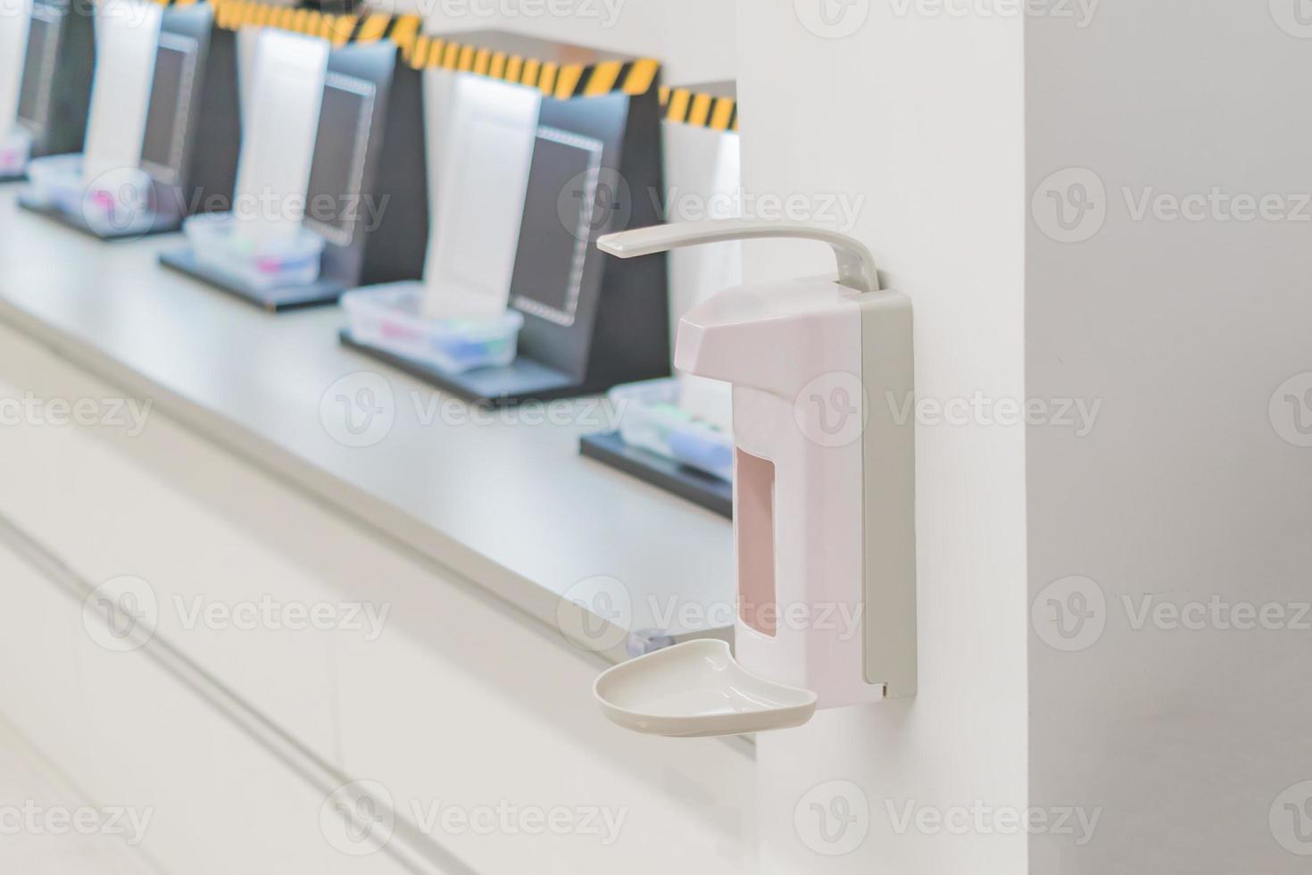 pharmaceutical factory equipment - Hand sanitizer dispenser. photo