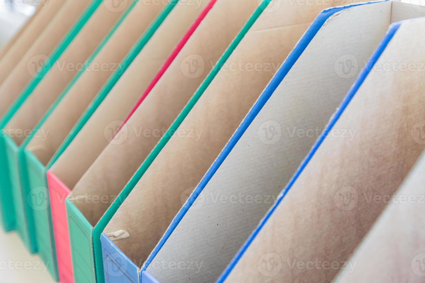 a row of empty folders for files and paper, office storage, business concept photo