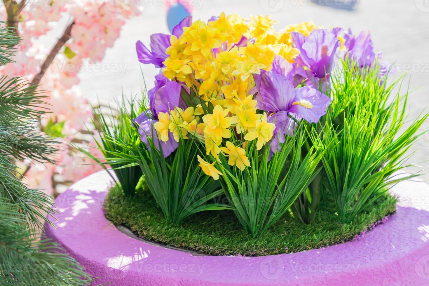 Colorful decoration by artificial flowers outdoors photo
