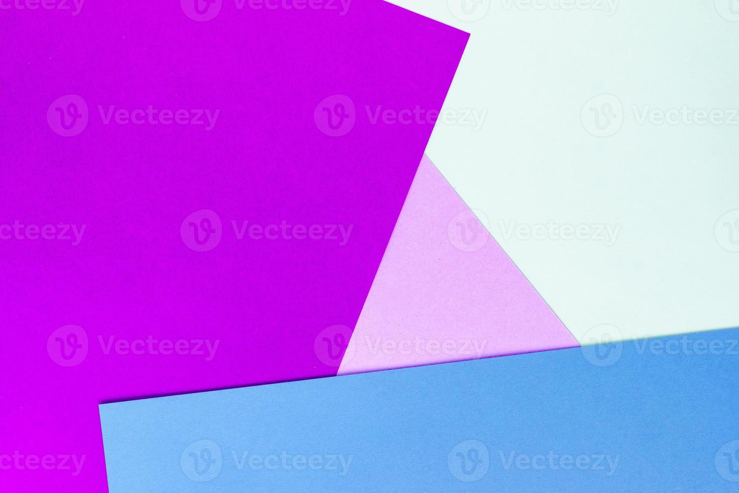 Abstract geometric paper background of purple, blue and beige colors photo