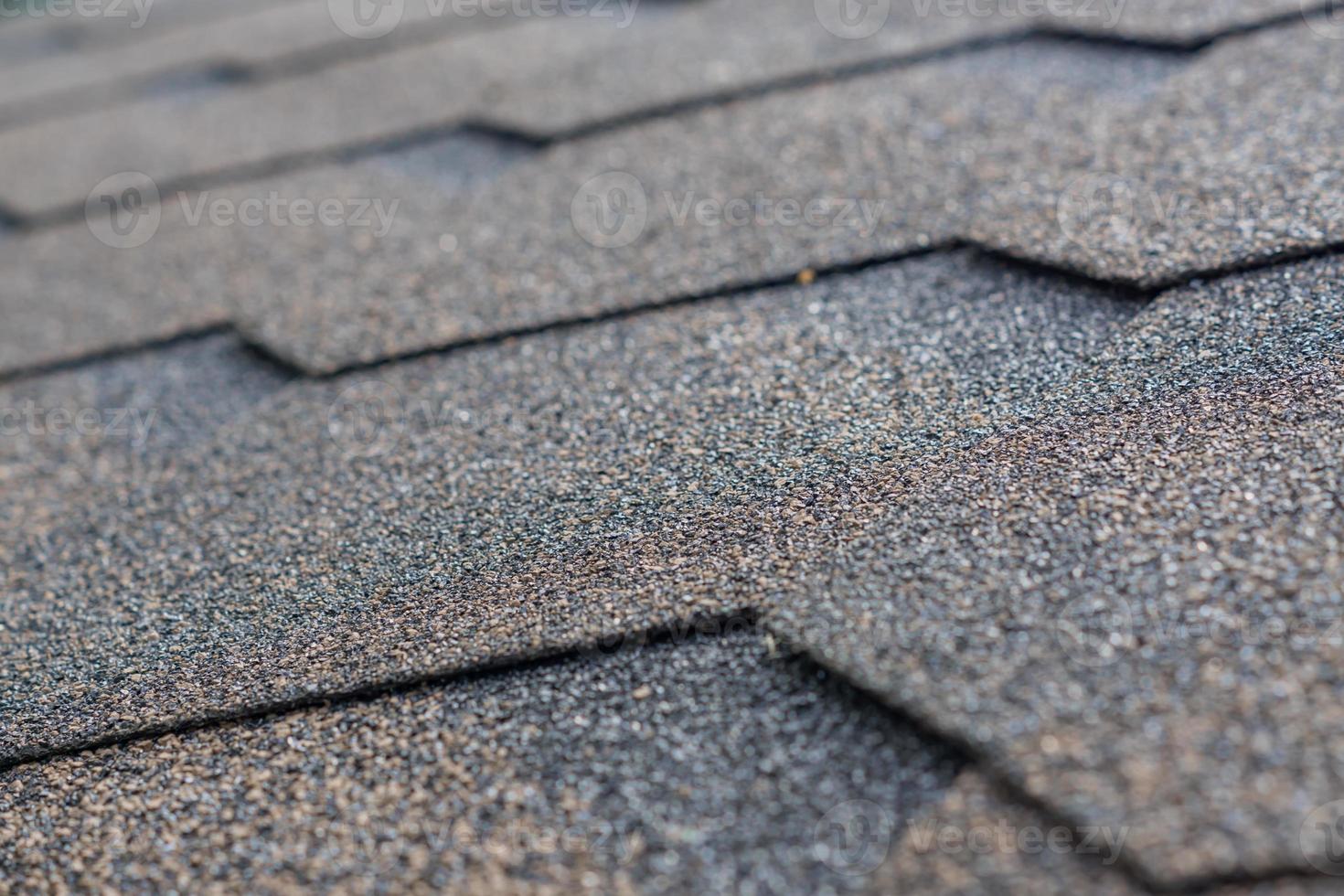Roobing shingles background. Selective focus photo
