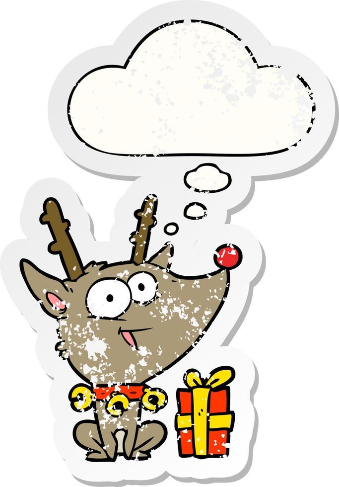 cartoon christmas reindeer and thought bubble as a distressed worn sticker vector