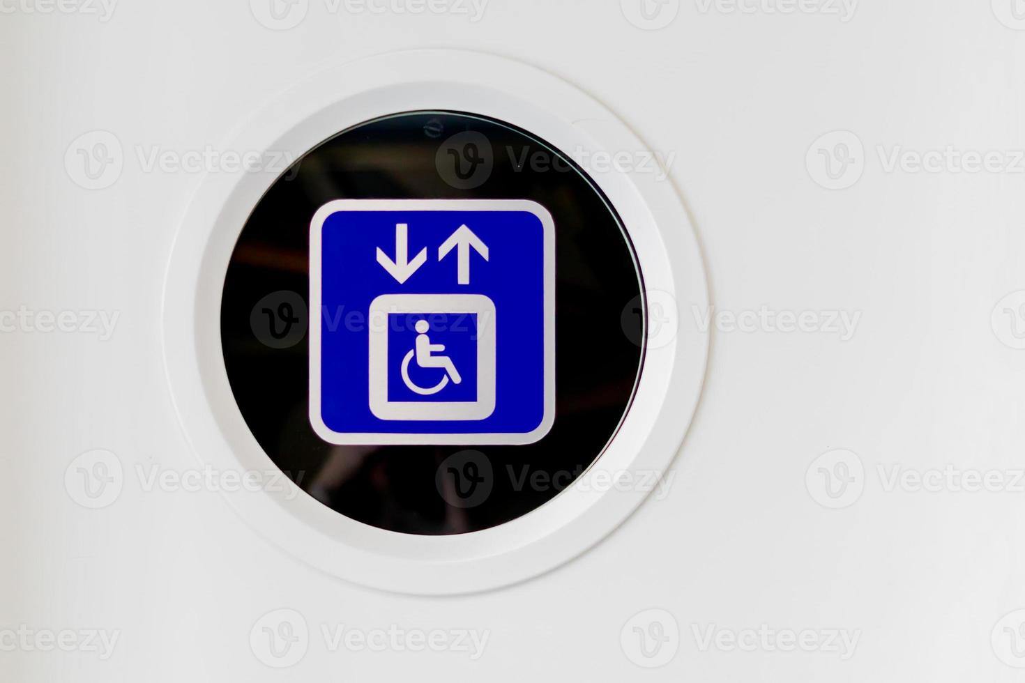 Lift for disabled people. Sticker sighn on elivator door in the office photo