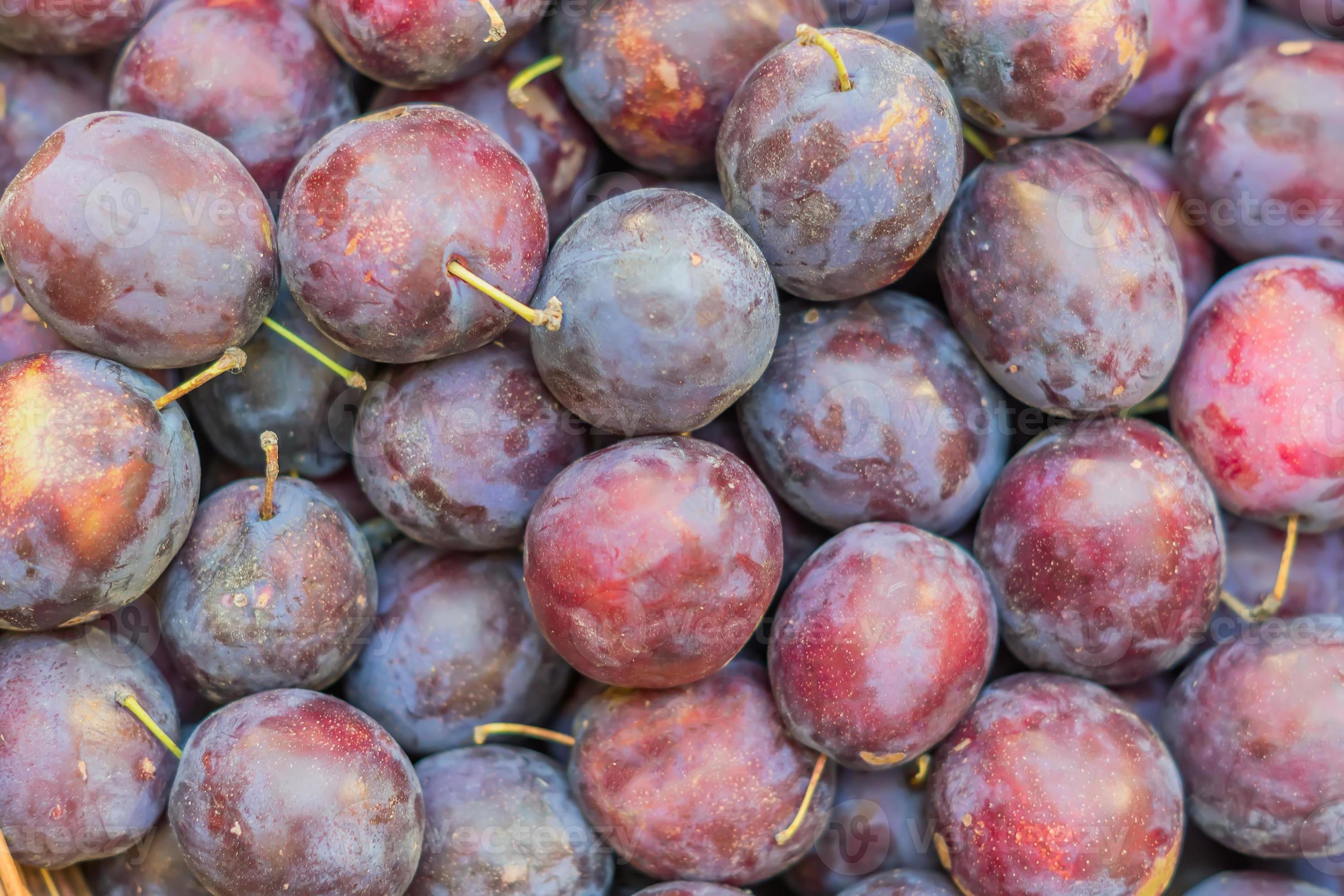 top view of ripe plums, fresh organic fruits background 10607456 Stock