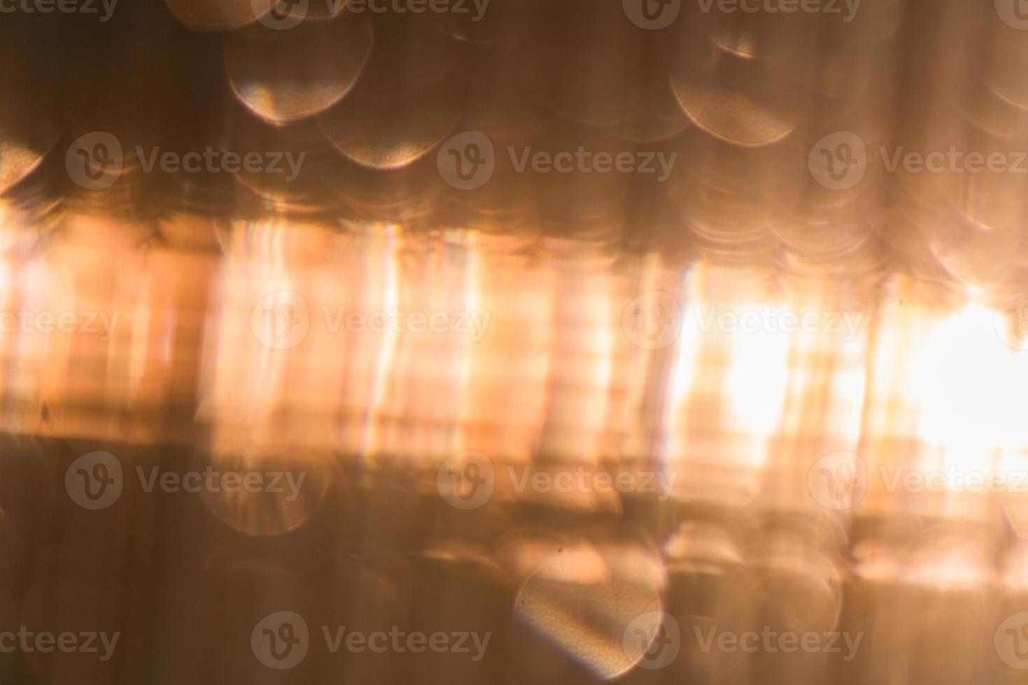 Defocused Polycarbonate plastic sheet, abstract background texture photo