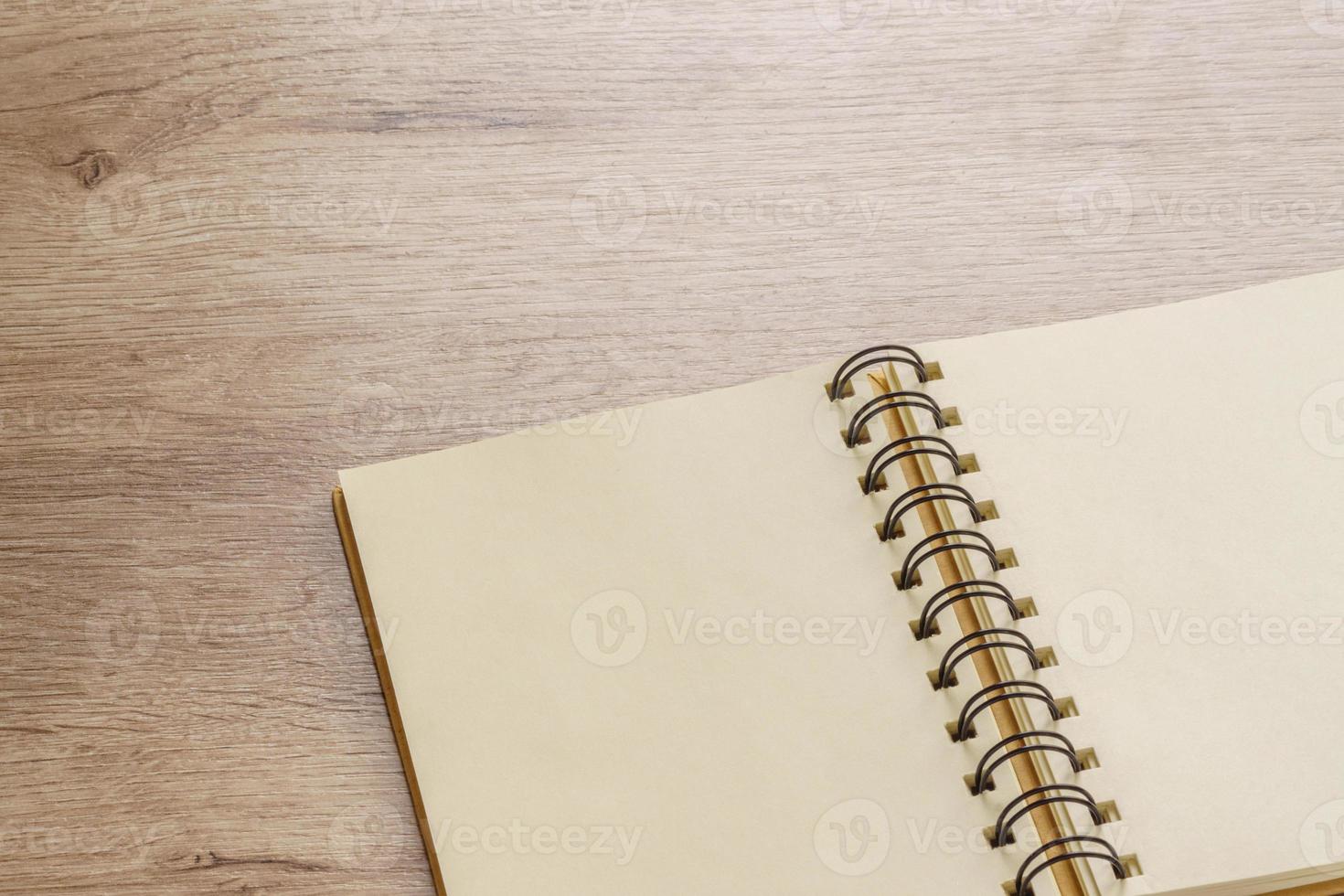 Design concept - empty kraft notebook on table background. mock up. photo