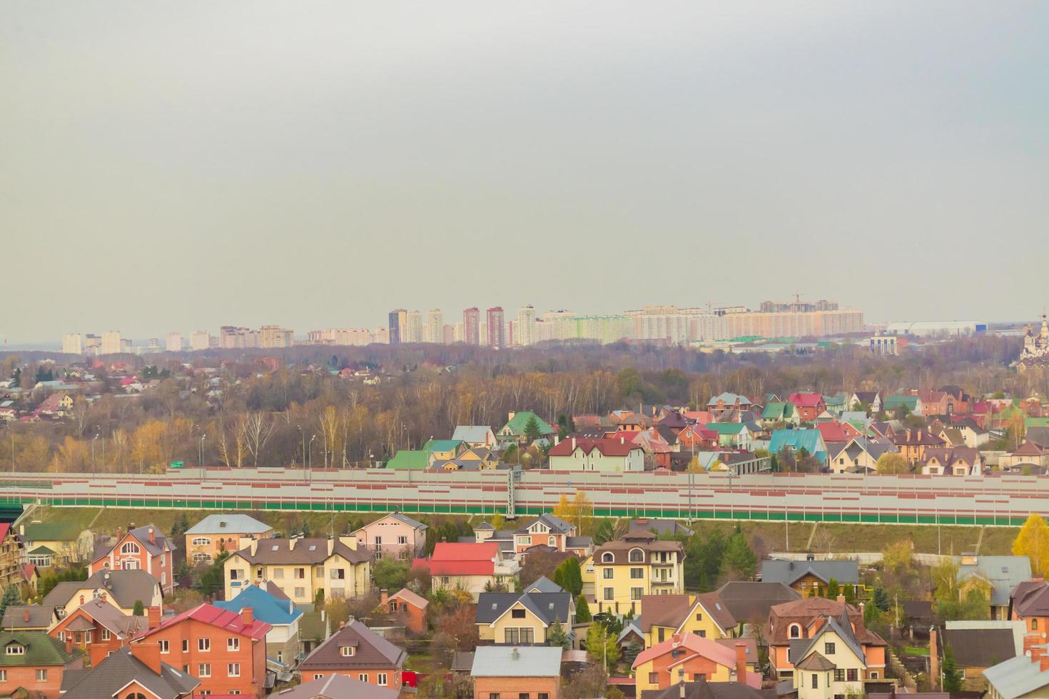 Khimki, Russia, 2018 - Areal view of a part of Khimki city with a plenty of buildings in neighborhood in autumn. Urban Landscape photo