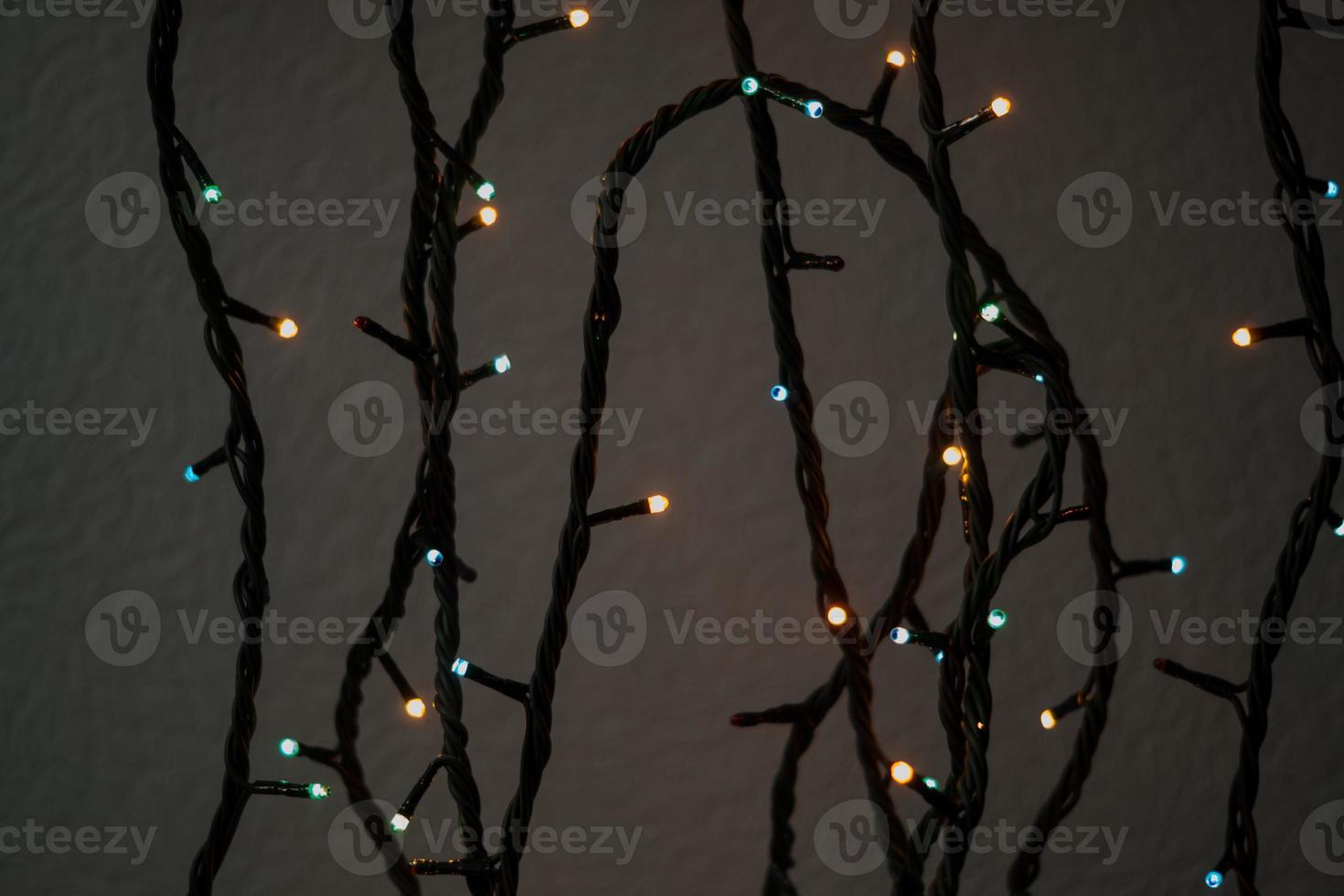 Abstract bokeh background. Defocused light from garland. photo