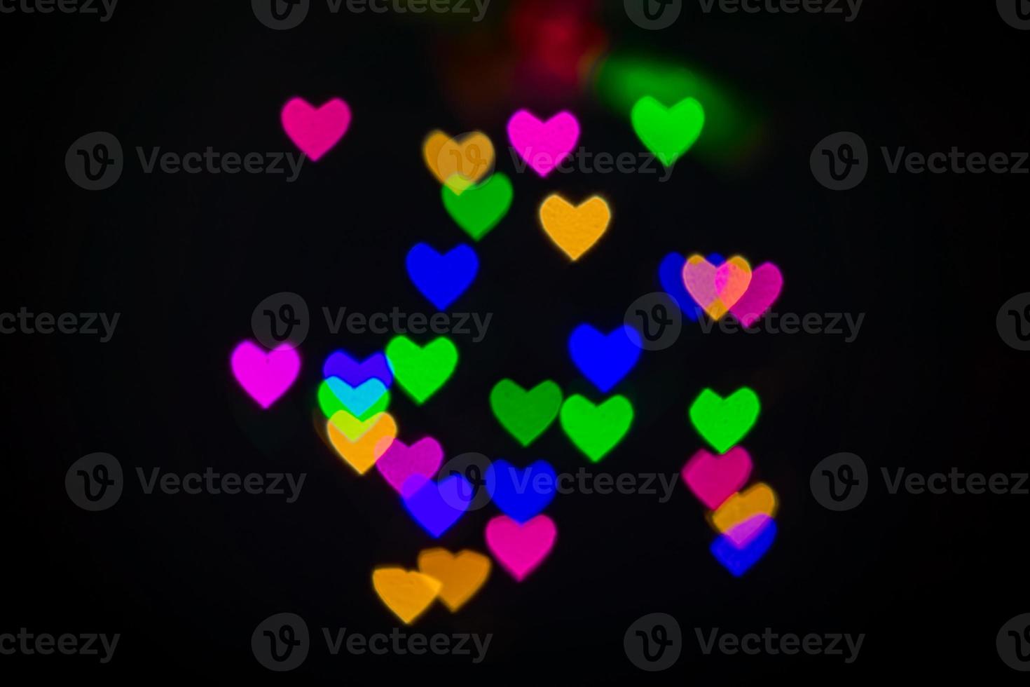 Heart bokeh background, Love and Valentine day concept. Multicolored Shiny hearts light photo