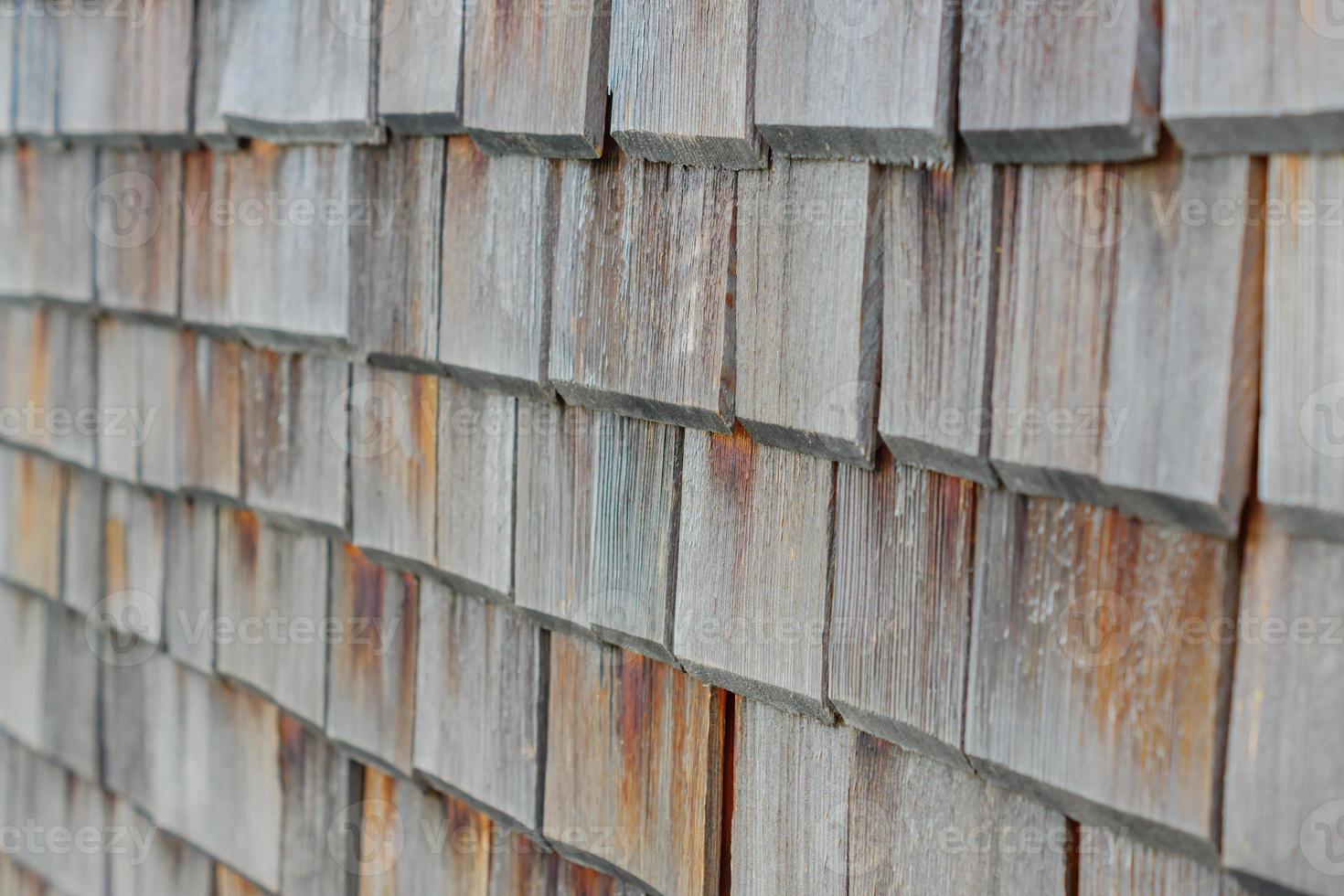 close up of decorative wooden wall made of old boards. Perspective view. Interior or exterior design photo
