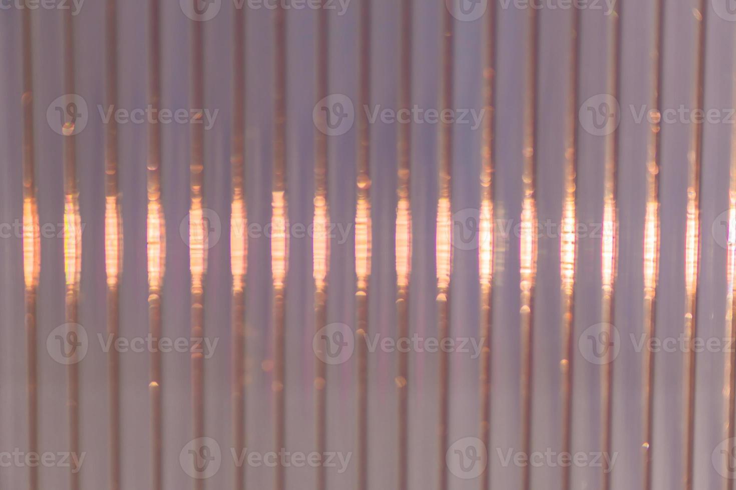 Defocused Polycarbonate plastic sheet, abstract background texture photo