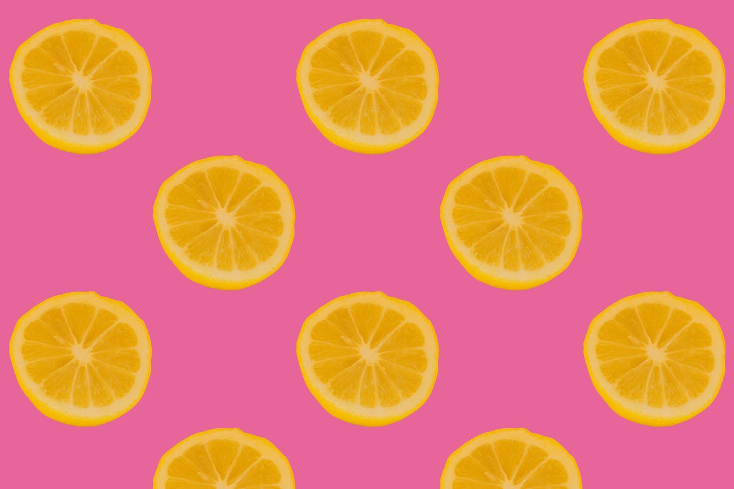 cutted fresh lemons on bright pink background 10610004 Stock Photo at