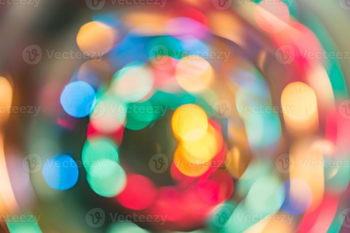Abstract burred texture background of colorful bokeh motion. Long exposure of small neon lights photo