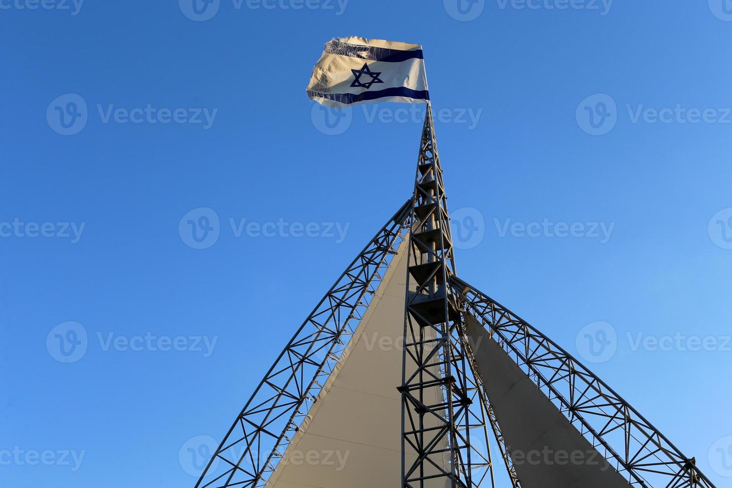 The blue and white Israeli flag with the Star of David. photo