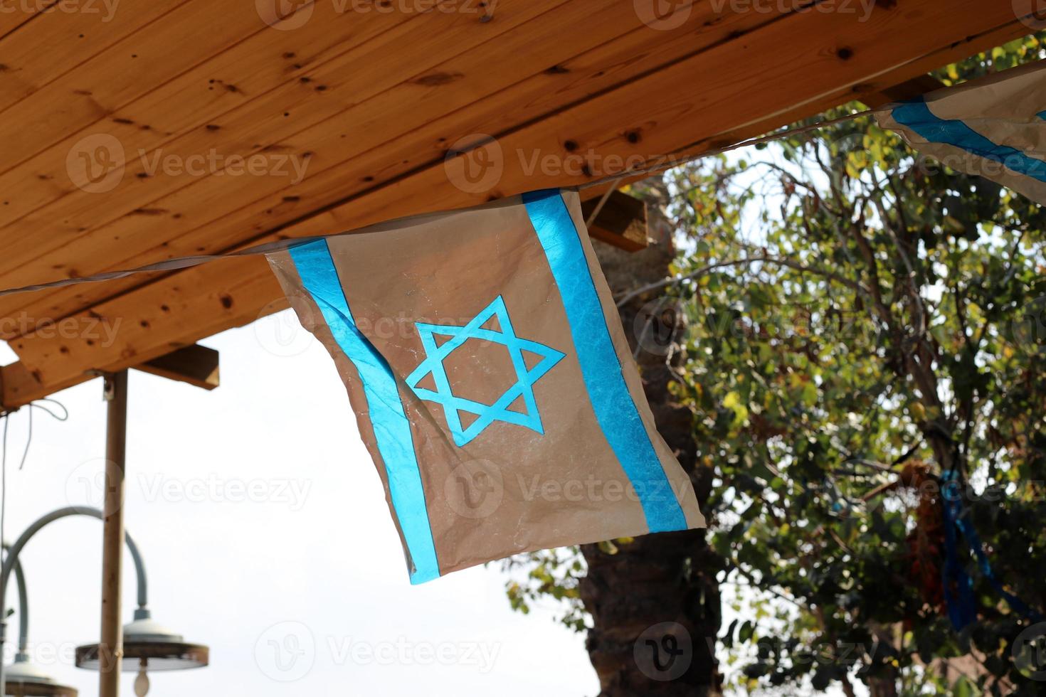 The blue and white Israeli flag with the Star of David. photo