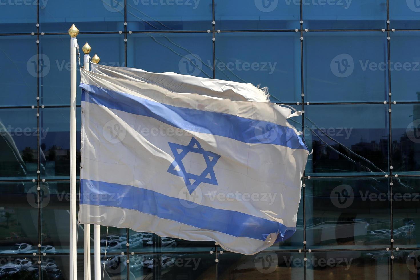 The blue and white Israeli flag with the Star of David. photo