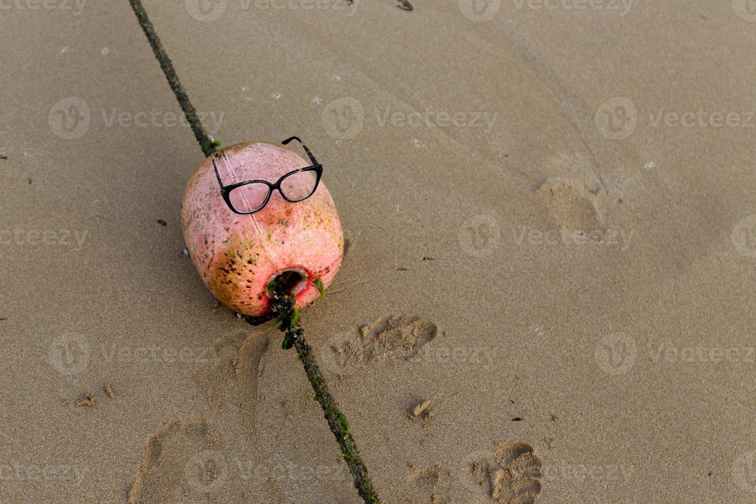 A rope with floats to secure a safe swimming area on the beach. photo