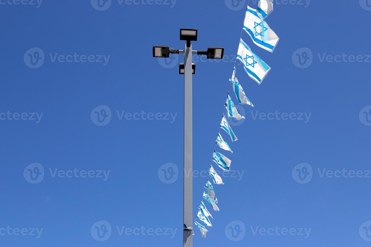 The blue and white Israeli flag with the Star of David. photo