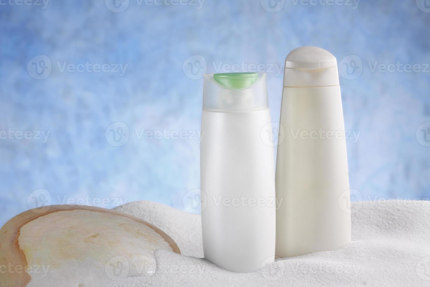 empty bottle on blue background photo