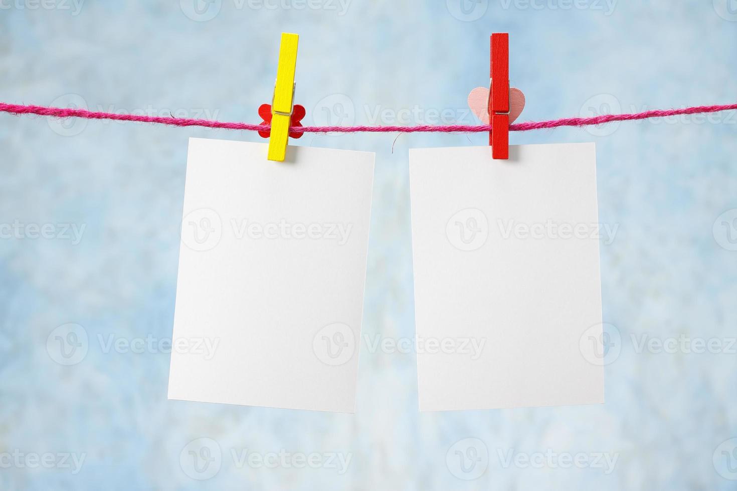 blank photo paper on blue background