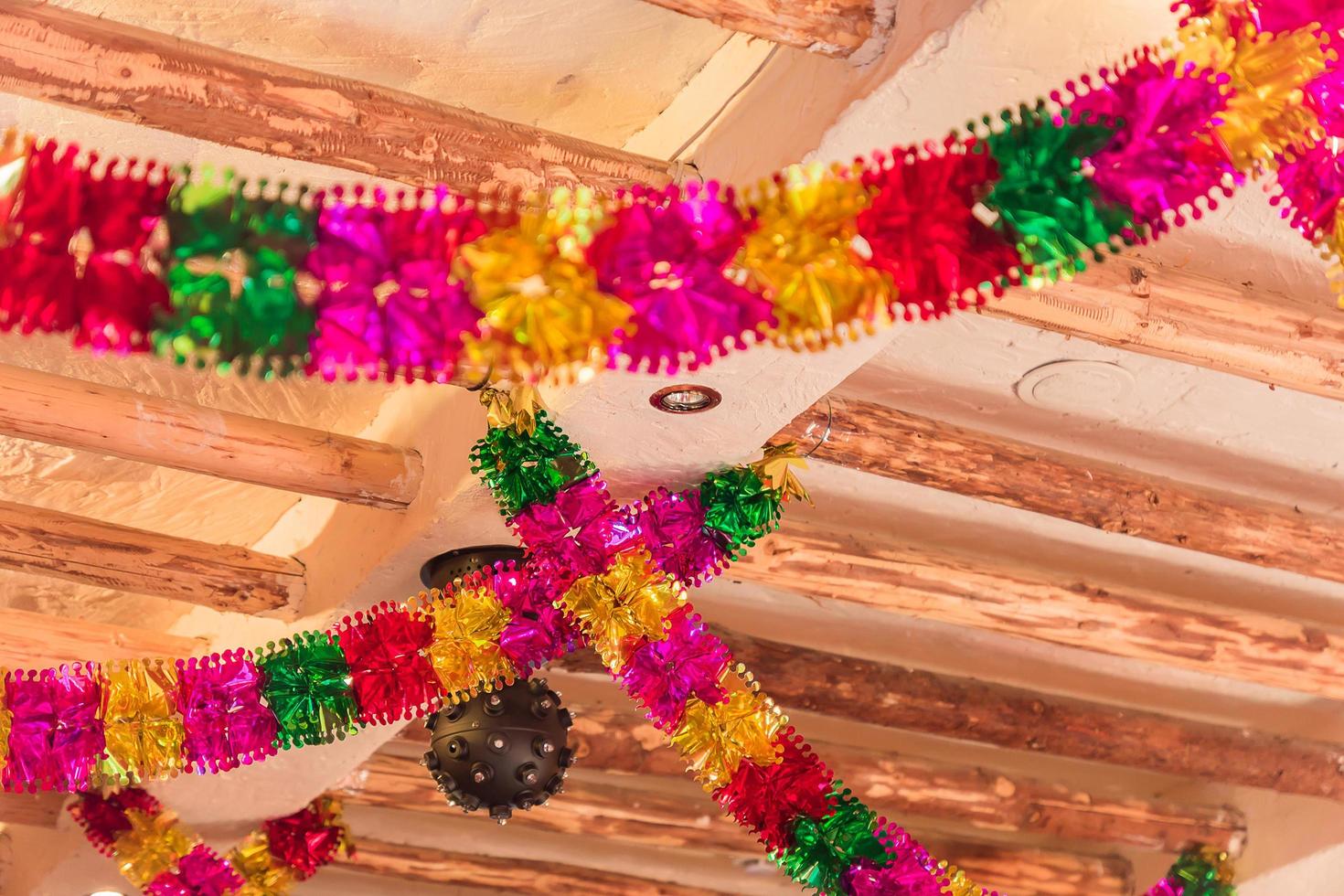 Christmas decoration garland of foil under the ceiling photo