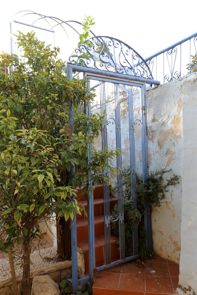 A door is an opening in a wall to enter and exit a building. photo
