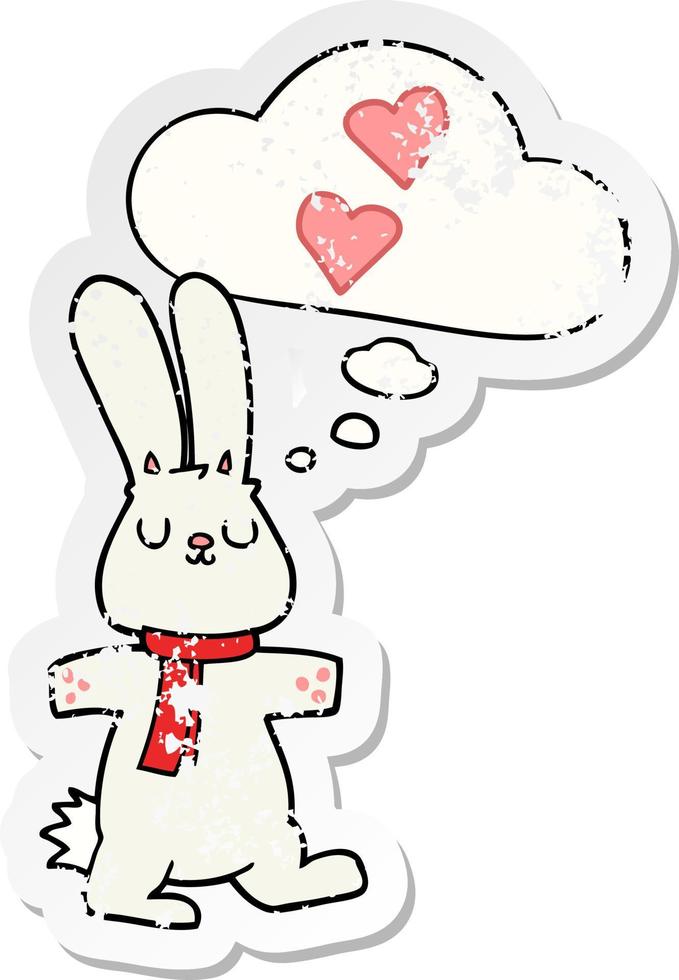 cartoon rabbit in love and thought bubble as a distressed worn sticker vector