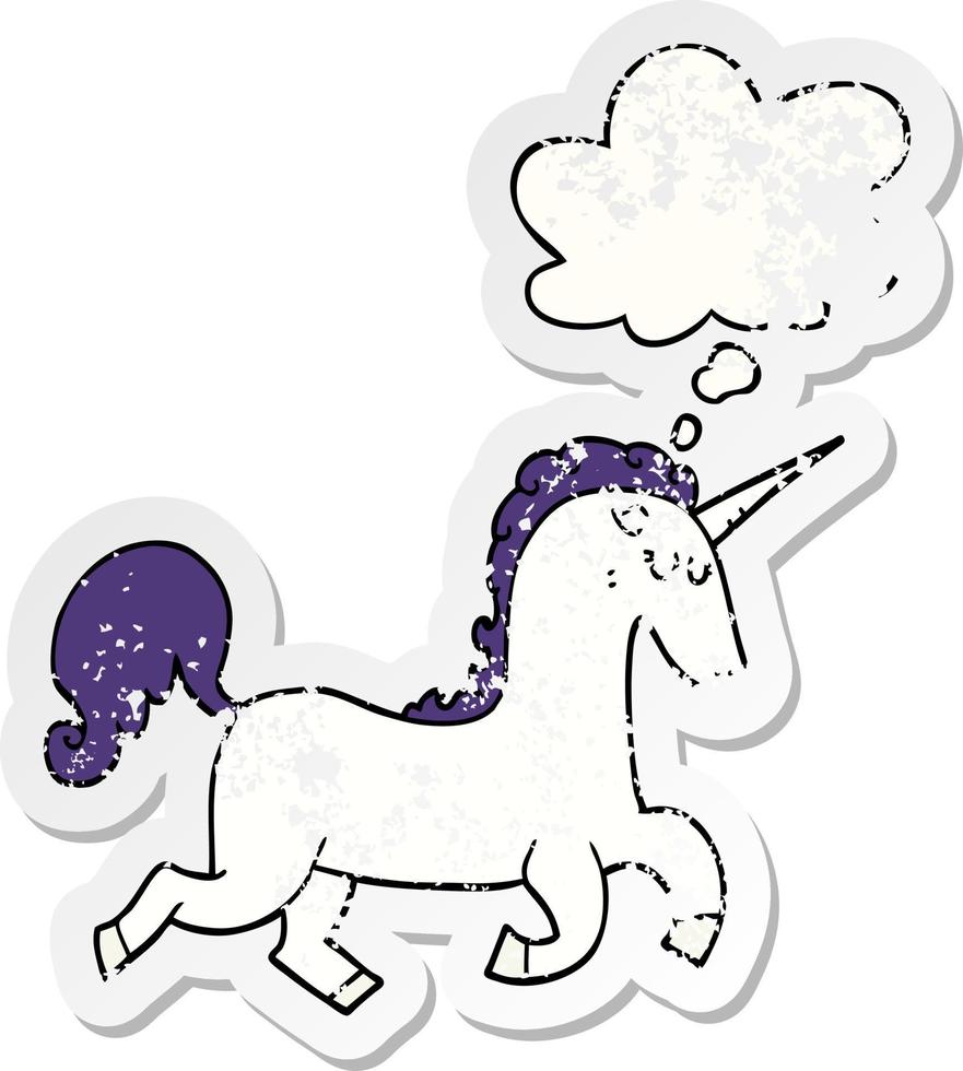 cartoon unicorn and thought bubble as a distressed worn sticker vector