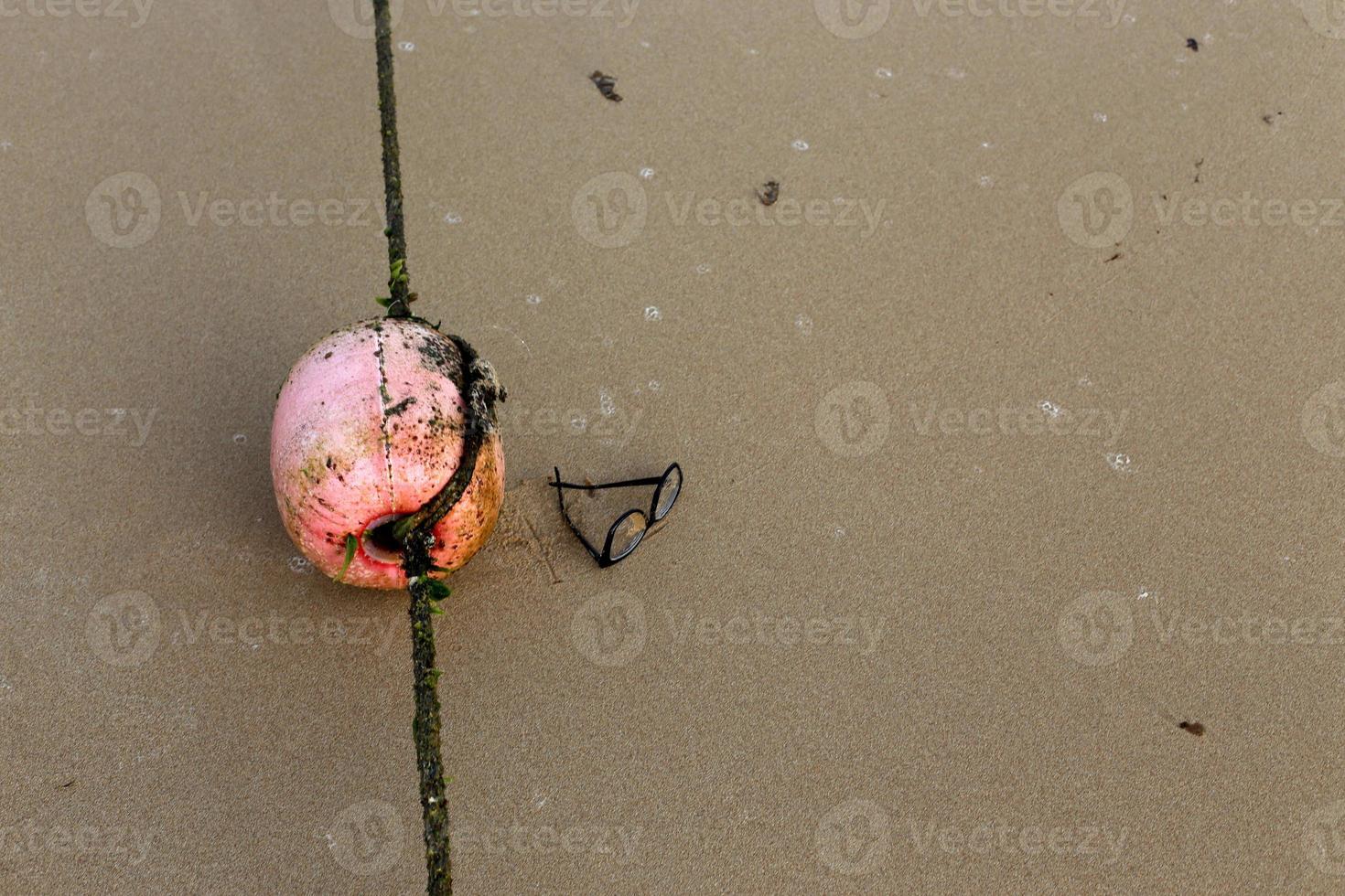 A rope with floats to secure a safe swimming area on the beach. photo