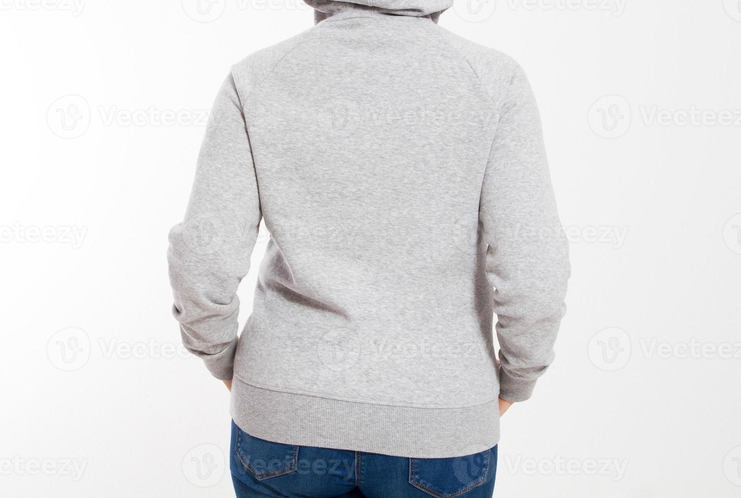 rear view of a woman in a hooded sweatshirt isolated, front cropped image photo