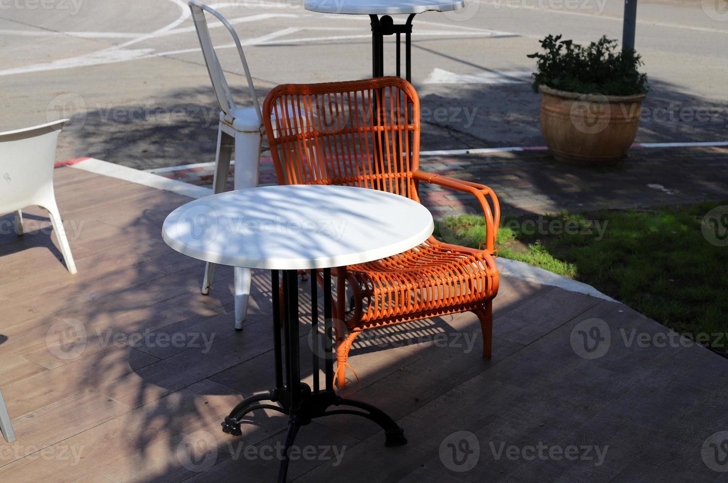 Chair for relaxing in a cafe on the Mediterranean coast photo